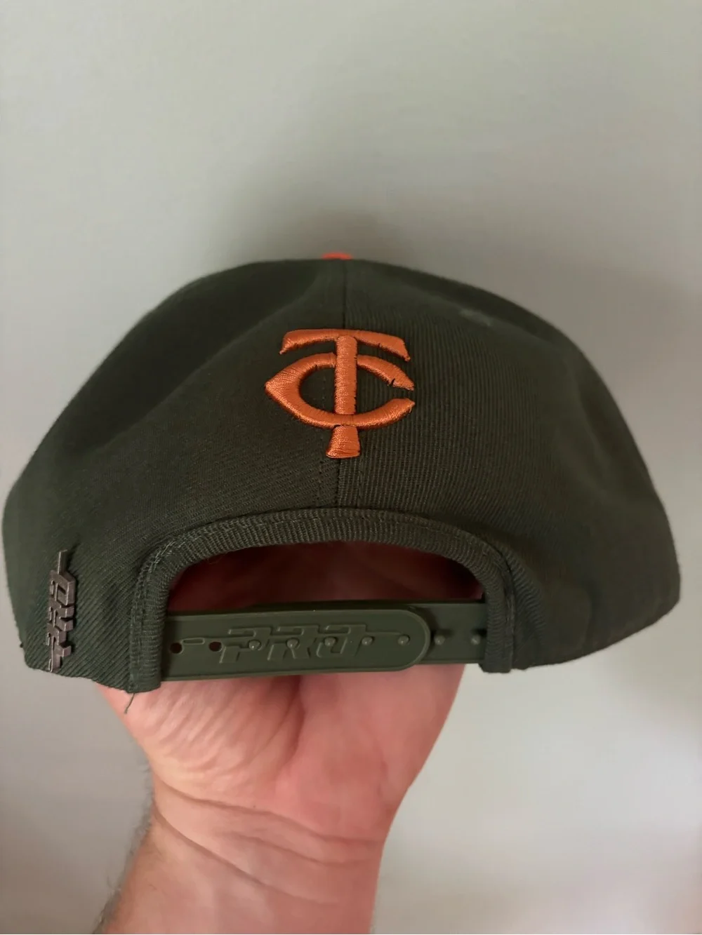 Men's Olive Green Snapback Hat with Orange Embroidered Logo